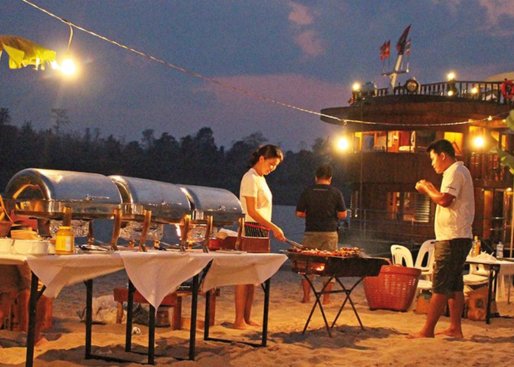 Celebrate a BBQ on sandbank with cocktails in hand and dance